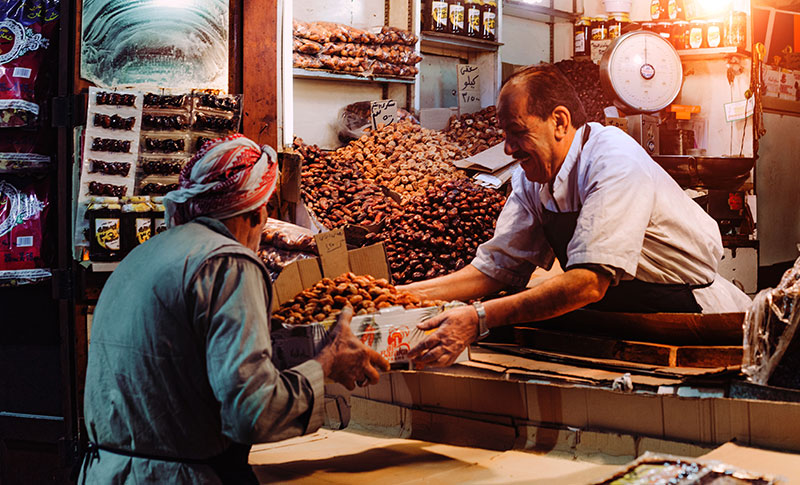 man selling to customer
